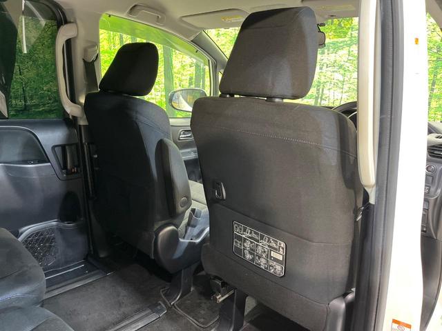 ヴォクシー V 両側電動ドア 後席モニター 9インチナビ バックカメラ 衝突被害軽減システム 禁煙車 ドラレコ スマートキー LEDヘッド ビルトインETC クルコン 純正15インチアルミ オートハイビーム(41枚目)