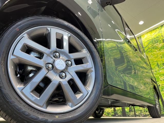 デリカミニ Ｇ　プレミアム　リミテッドエディション　両側電動ドア　純正９型ナビ　全周囲カメラ　衝突被害軽減システム　禁煙車　ハーフレザーシート　コーナーセンサ　スマートキー　ＬＥＤヘッド　ルーフレール　純正１５インチアルミ　オートライト　オートエアコン（13枚目）