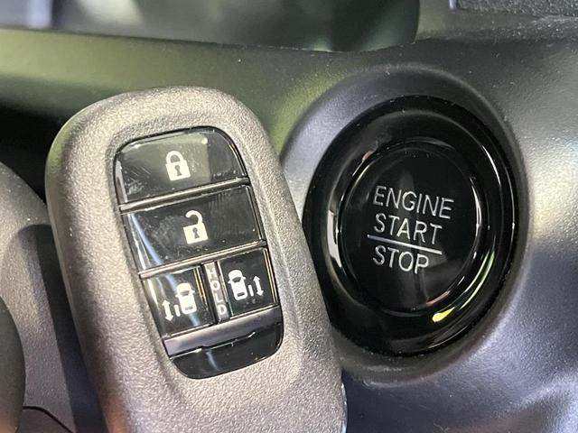 N-BOXカスタム ターボ 両側電動ドア 純正9型ナビ バックカメラ 衝突被害軽減システム レーダークルーズ 禁煙車 コーナーセンサー スマートキー LEDヘッド ビルトインETC 純正15インチアルミ(21枚目)