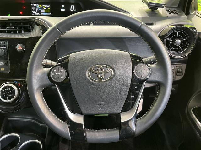 アクア クロスオーバー　衝突被害軽減システム　禁煙車　ハーフレザーシート　ＥＴＣ　純正１６インチアルミ　オートエアコン　ＣＤ　プライバシーガラス（11枚目）