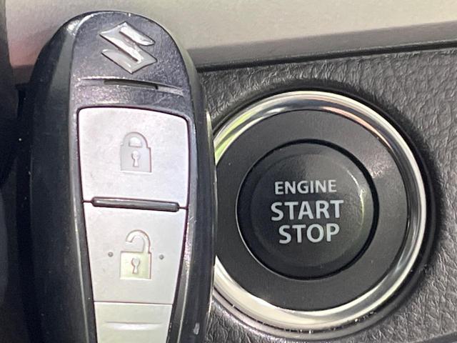 スイフト ＲＳ　禁煙車　スマートキー　ＨＩＤヘッド　純正１６インチアルミ　オートライト　オートエアコン　ＣＤ（4枚目）