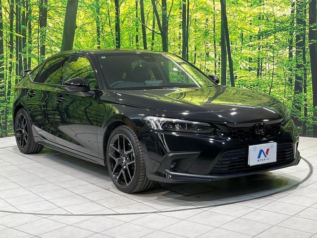 シビック ｅ：ＨＥＶ　純正９型ナビ　テールゲートスポイラー　バックカメラ　ＢＯＳＥサウンド　衝突被害軽減システム　レーダークルーズ　禁煙車　ハーフレザーシート　コーナーセンサー　スマートキー　ＬＥＤヘッド　ＥＴＣ２．０（16枚目）