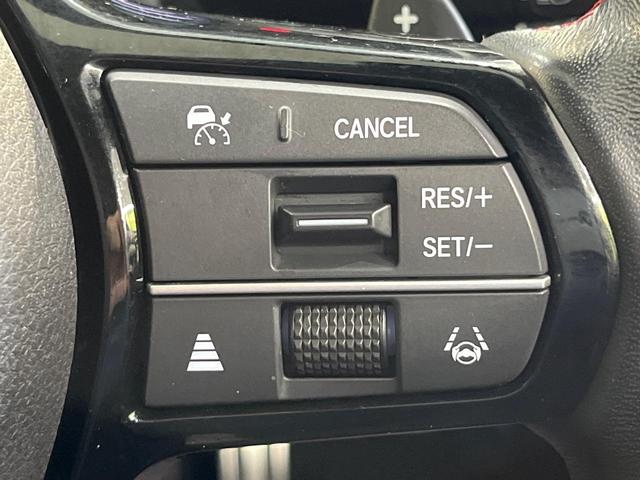 シビック ｅ：ＨＥＶ　純正９型ナビ　テールゲートスポイラー　バックカメラ　ＢＯＳＥサウンド　衝突被害軽減システム　レーダークルーズ　禁煙車　ハーフレザーシート　コーナーセンサー　スマートキー　ＬＥＤヘッド　ＥＴＣ２．０（26枚目）