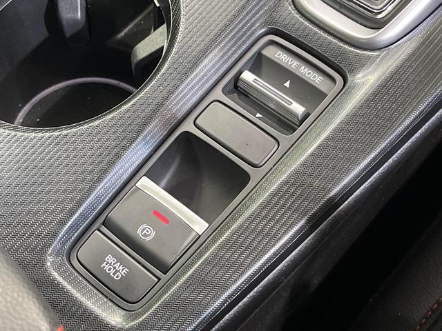 シビック ｅ：ＨＥＶ　純正９型ナビ　テールゲートスポイラー　バックカメラ　ＢＯＳＥサウンド　衝突被害軽減システム　レーダークルーズ　禁煙車　ハーフレザーシート　コーナーセンサー　スマートキー　ＬＥＤヘッド　ＥＴＣ２．０（35枚目）