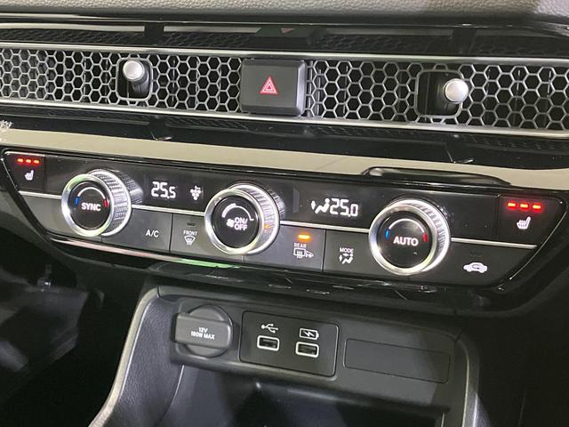 シビック ｅ：ＨＥＶ　純正９型ナビ　テールゲートスポイラー　バックカメラ　ＢＯＳＥサウンド　衝突被害軽減システム　レーダークルーズ　禁煙車　ハーフレザーシート　コーナーセンサー　スマートキー　ＬＥＤヘッド　ＥＴＣ２．０（40枚目）