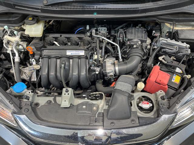 フィットハイブリッド Ｓ　ホンダセンシング　純正ＳＤナビ　バックカメラ　衝突被害軽減システム　レーダークルーズ　禁煙車　スマートキー　ＬＥＤヘッド　ビルトインＥＴＣ　純正１６インチアルミ　車線逸脱警報　オートライト　オートエアコン（18枚目）