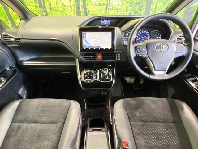 ヴォクシー ハイブリッドＺＳ　煌ＩＩＩ　両側電動ドア　純正９型ナビ　後席モニター　バックカメラ　衝突被害軽減システム　禁煙車　ハーフレザーシート　ドラレコ　コーナーセンサー　スマートキー　ＬＥＤヘッド　ビルトインＥＴＣ　クルコン（2枚目）