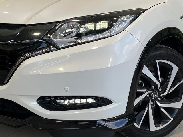 ヴェゼル ハイブリッドRS・ホンダセンシング 純正SDナビ バックカメラ 衝突被害軽減システム ハーフレザーシート スマートキー LEDヘッド ビルトインETC 純正18インチアルミ オートライト デュアルエアコン Bluetooth CD(12枚目)