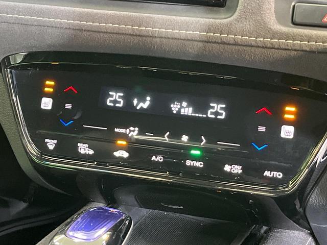 ヴェゼル ハイブリッドRS・ホンダセンシング 純正SDナビ バックカメラ 衝突被害軽減システム ハーフレザーシート スマートキー LEDヘッド ビルトインETC 純正18インチアルミ オートライト デュアルエアコン Bluetooth CD(23枚目)