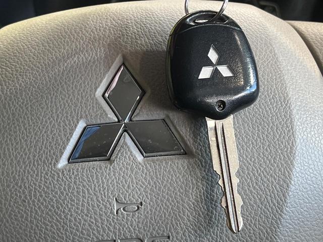 ｅＫワゴン Ｅ　ｅ－アシスト　ＳＤナビ　バックカメラ　禁煙車　シートヒーター　ＥＴＣ　ＣＤ　地デジ　トラクションコントロール　電動格納ミラー　アームレスト　ドアバイザー　プライバシーガラス（21枚目）