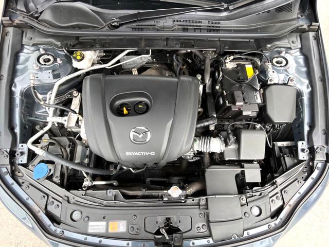 ＭＡＺＤＡ３ファストバック １５Ｓツーリング　６ＭＴ　スマートブレーキサポート　８．８インチマツダコネクト　バックカメラ　ブラインドスポット　ＬＥＤヘッド　レーンキープアシスト　純正１８インチＡＷ　革巻きステアリング　クリアランスソナー　禁煙車（19枚目）