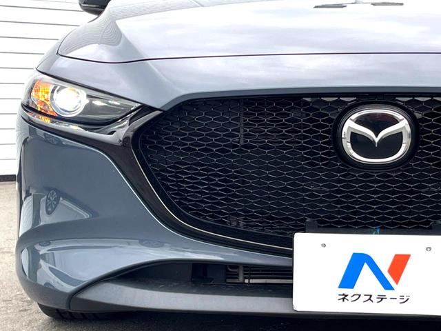 ＭＡＺＤＡ３ファストバック １５Ｓツーリング　６ＭＴ　スマートブレーキサポート　８．８インチマツダコネクト　バックカメラ　ブラインドスポット　ＬＥＤヘッド　レーンキープアシスト　純正１８インチＡＷ　革巻きステアリング　クリアランスソナー　禁煙車（23枚目）