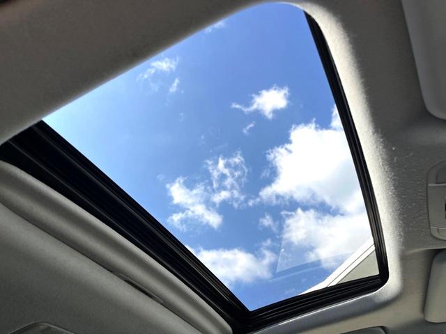 プリウス Aプレミアム 後期 モデリスタエアロ ムーンルーフ セーフティセンス 純正ナビ バックカメラ 黒革 ブラインドスポット LEDヘッド レーダークルーズ 純正15インチAW シートベンチレーション 革巻きステアリング(4枚目)