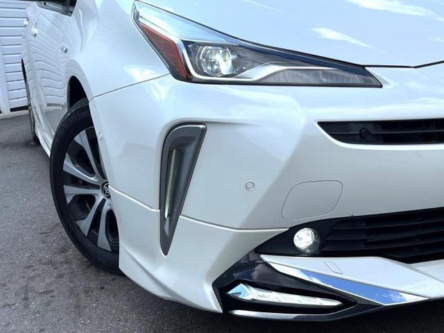 プリウス Aプレミアム 後期 モデリスタエアロ ムーンルーフ セーフティセンス 純正ナビ バックカメラ 黒革 ブラインドスポット LEDヘッド レーダークルーズ 純正15インチAW シートベンチレーション 革巻きステアリング(13枚目)