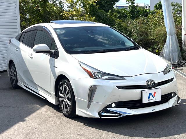 プリウス Aプレミアム 後期 モデリスタエアロ ムーンルーフ セーフティセンス 純正ナビ バックカメラ 黒革 ブラインドスポット LEDヘッド レーダークルーズ 純正15インチAW シートベンチレーション 革巻きステアリング(17枚目)