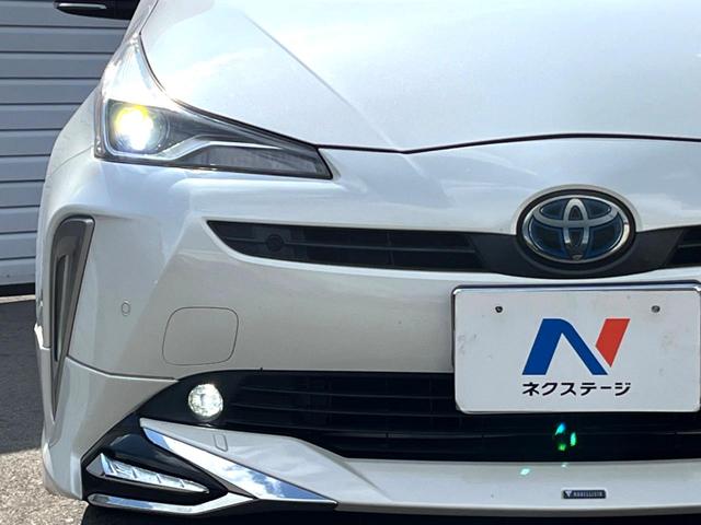 プリウス Aプレミアム 後期 モデリスタエアロ ムーンルーフ セーフティセンス 純正ナビ バックカメラ 黒革 ブラインドスポット LEDヘッド レーダークルーズ 純正15インチAW シートベンチレーション 革巻きステアリング(26枚目)