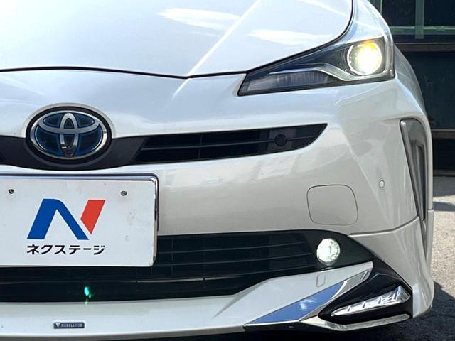 プリウス Aプレミアム 後期 モデリスタエアロ ムーンルーフ セーフティセンス 純正ナビ バックカメラ 黒革 ブラインドスポット LEDヘッド レーダークルーズ 純正15インチAW シートベンチレーション 革巻きステアリング(27枚目)