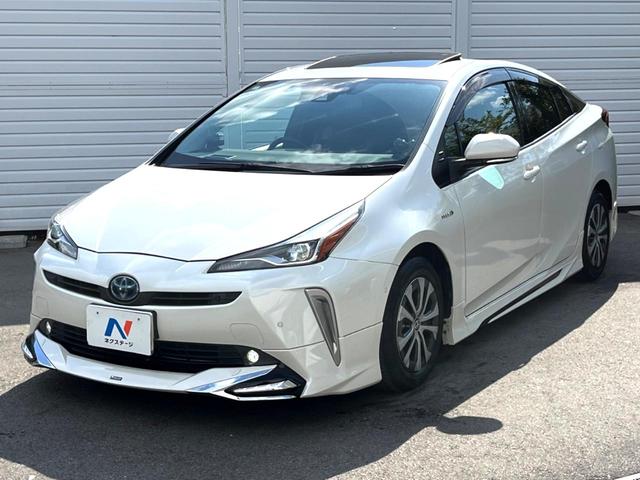 プリウス Aプレミアム 後期 モデリスタエアロ ムーンルーフ セーフティセンス 純正ナビ バックカメラ 黒革 ブラインドスポット LEDヘッド レーダークルーズ 純正15インチAW シートベンチレーション 革巻きステアリング(28枚目)