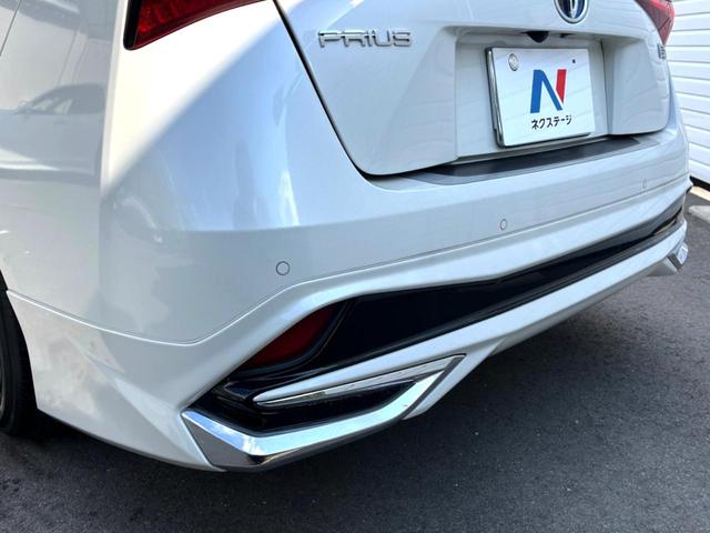 プリウス Aプレミアム 後期 モデリスタエアロ ムーンルーフ セーフティセンス 純正ナビ バックカメラ 黒革 ブラインドスポット LEDヘッド レーダークルーズ 純正15インチAW シートベンチレーション 革巻きステアリング(35枚目)