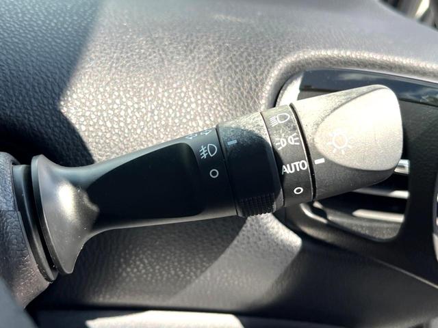 プリウス Aプレミアム 後期 モデリスタエアロ ムーンルーフ セーフティセンス 純正ナビ バックカメラ 黒革 ブラインドスポット LEDヘッド レーダークルーズ 純正15インチAW シートベンチレーション 革巻きステアリング(51枚目)