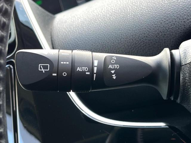 プリウス Aプレミアム 後期 モデリスタエアロ ムーンルーフ セーフティセンス 純正ナビ バックカメラ 黒革 ブラインドスポット LEDヘッド レーダークルーズ 純正15インチAW シートベンチレーション 革巻きステアリング(52枚目)