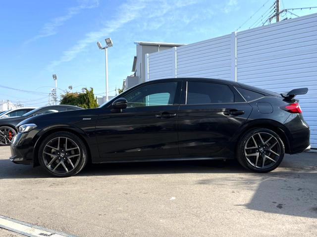 シビック ｅ：ＨＥＶ　ホンダセンシング　テールゲートスポイラー　ＢＯＳＥ　ホンダコネクトディスプレイ　バックカメラ　ハーフレザー　パワーシート　シートヒーター　ＬＥＤヘッド　純正１８インチＡＷ　革巻きステアリング　禁煙車（29枚目）