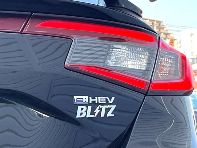 シビック ｅ：ＨＥＶ　ホンダセンシング　テールゲートスポイラー　ＢＯＳＥ　ホンダコネクトディスプレイ　バックカメラ　ハーフレザー　パワーシート　シートヒーター　ＬＥＤヘッド　純正１８インチＡＷ　革巻きステアリング　禁煙車（33枚目）