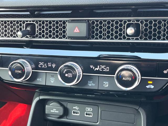 シビック ｅ：ＨＥＶ　ホンダセンシング　テールゲートスポイラー　ＢＯＳＥ　ホンダコネクトディスプレイ　バックカメラ　ハーフレザー　パワーシート　シートヒーター　ＬＥＤヘッド　純正１８インチＡＷ　革巻きステアリング　禁煙車（58枚目）