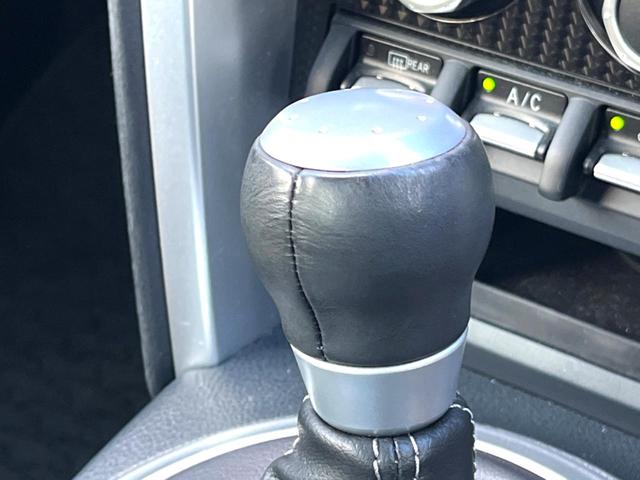 86 GT 純正ナビ クルーズコントロール LEDヘッド 純正17インチAW アルミペダル 純正革巻きステアリング パドルシフト デュアルオートエアコン オートライト 横滑り防止装置 ステアリングスイッチ 禁煙車(50枚目)