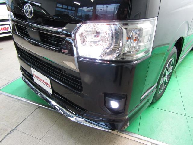 ハイエースバン スーパーGL ダークプライムII TSS Mナビ フルセグ CD DVD Bluetooth Bカメラ Dインナーミラー モデエアロ・マフラー スマートキー ハーフレザー 両側電動ドア 100V電源 ビルトインETC LEDヘッド(47枚目)