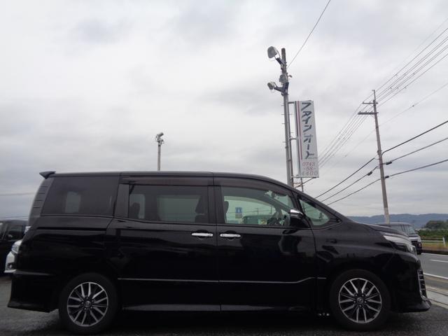 ヴォクシー ZS 煌II 1年走行距離無制限保証付/両側パワースライドドア/ナビ/TV/バックモニター/ETC/アイドリングストップ/プッシュスタート/オートハイビーム/純正16AW/オートライト/フロントフォグライト(4枚目)