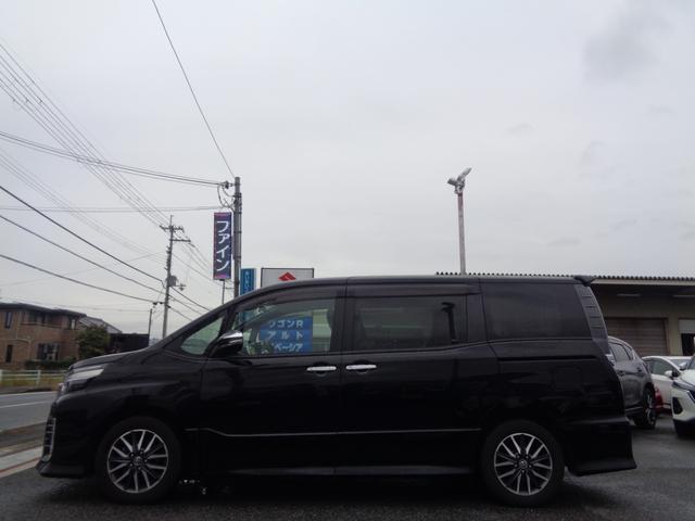 ヴォクシー ZS 煌II 1年走行距離無制限保証付/両側パワースライドドア/ナビ/TV/バックモニター/ETC/アイドリングストップ/プッシュスタート/オートハイビーム/純正16AW/オートライト/フロントフォグライト(5枚目)