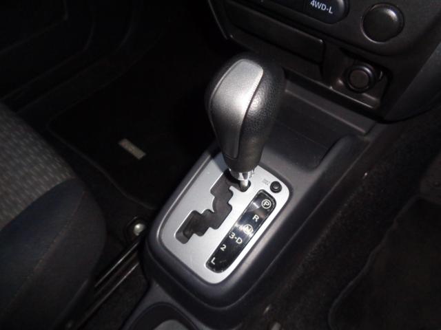 ジムニー ＸＧ　１年走行距離無制限保証付／パートタイム４ＷＤ／ＦＭラジオ／ＡＭラジオ／ＣＤ／フェンダーミラー／背面タイヤ／キーレス／前席パワーウィンドウスイッチ／フロア４速オートマ／エアコン／運転席・助手席エアバック（13枚目）