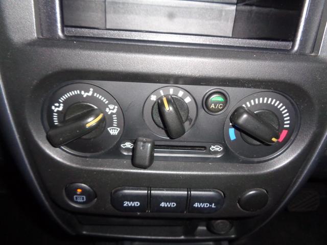 ジムニー ＸＧ　１年走行距離無制限保証付／パートタイム４ＷＤ／ＦＭラジオ／ＡＭラジオ／ＣＤ／フェンダーミラー／背面タイヤ／キーレス／前席パワーウィンドウスイッチ／フロア４速オートマ／エアコン／運転席・助手席エアバック（18枚目）