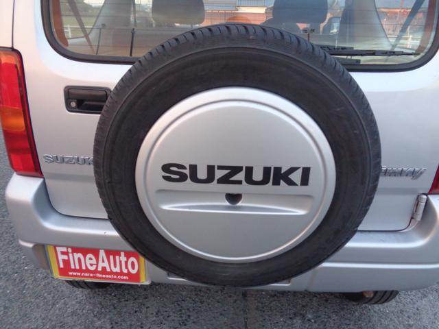 ジムニー ＸＧ　１年走行距離無制限保証付／パートタイム４ＷＤ／ＦＭラジオ／ＡＭラジオ／ＣＤ／フェンダーミラー／背面タイヤ／キーレス／前席パワーウィンドウスイッチ／フロア４速オートマ／エアコン／運転席・助手席エアバック（20枚目）