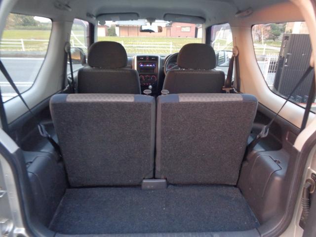 ジムニー ＸＧ　１年走行距離無制限保証付／パートタイム４ＷＤ／ＦＭラジオ／ＡＭラジオ／ＣＤ／フェンダーミラー／背面タイヤ／キーレス／前席パワーウィンドウスイッチ／フロア４速オートマ／エアコン／運転席・助手席エアバック（47枚目）