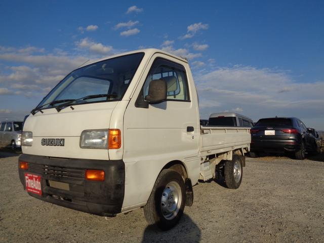 キャリイトラック KU 荷台三方開き/スズキ純正AMラジオ/フロア5速ミッション/走行距離1万8千km/2WD/取扱説明書あり(4枚目)
