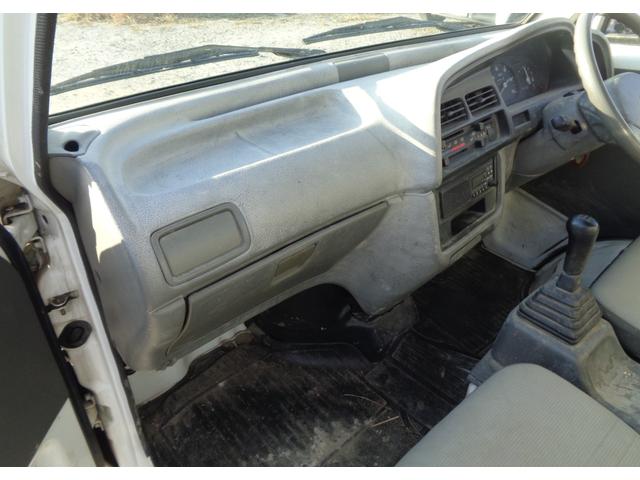 キャリイトラック KU 荷台三方開き/スズキ純正AMラジオ/フロア5速ミッション/走行距離1万8千km/2WD/取扱説明書あり(22枚目)