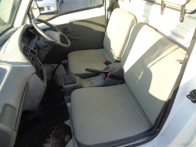 キャリイトラック KU 荷台三方開き/スズキ純正AMラジオ/フロア5速ミッション/走行距離1万8千km/2WD/取扱説明書あり(24枚目)