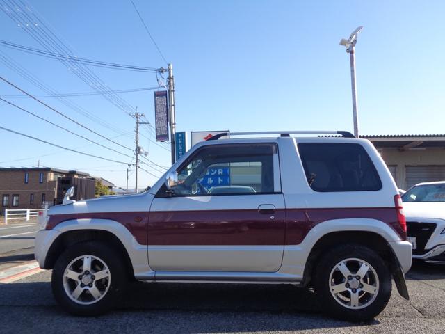 パジェロミニ エクシード　１年走行距離無制限保証付／パートタイム４ＷＤ／外品ナビ／ＣＤ／ＴＶ／ＦＭ・ＡＭラジオ／ＥＴＣ／フロントフォグライト／背面タイヤ／純正１５ＡＷ／フェンダーミラー／ルーフレール／ヘッドライトレベライザー（5枚目）