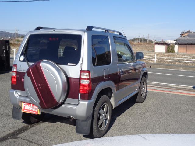 パジェロミニ エクシード　１年走行距離無制限保証付／パートタイム４ＷＤ／外品ナビ／ＣＤ／ＴＶ／ＦＭ・ＡＭラジオ／ＥＴＣ／フロントフォグライト／背面タイヤ／純正１５ＡＷ／フェンダーミラー／ルーフレール／ヘッドライトレベライザー（8枚目）
