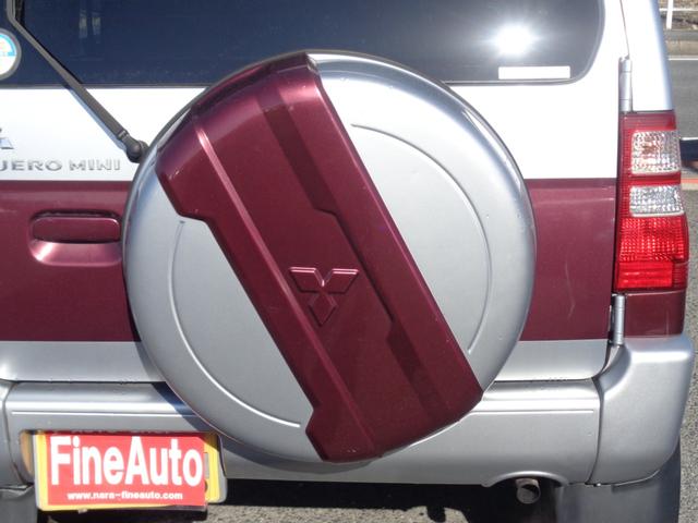 パジェロミニ エクシード　１年走行距離無制限保証付／パートタイム４ＷＤ／外品ナビ／ＣＤ／ＴＶ／ＦＭ・ＡＭラジオ／ＥＴＣ／フロントフォグライト／背面タイヤ／純正１５ＡＷ／フェンダーミラー／ルーフレール／ヘッドライトレベライザー（28枚目）