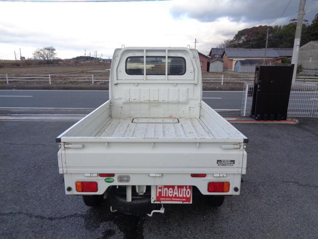 キャリイトラック ＫＣエアコン・パワステ　１年走行距離無制限保証付／パートタイム４ＷＤ／ＥＴＣ／ＦＭラジオ／ＡＭラジオ／荷台三方開き／スペアタイヤ／ヘッドライトレベライザー／運転席エアバッグ／フロアー３速オートマ／エアコン／パワーステアリング（7枚目）