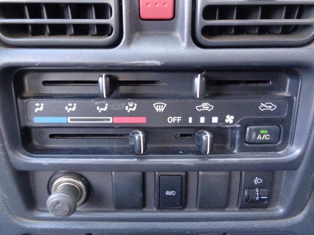 キャリイトラック ＫＣエアコン・パワステ　１年走行距離無制限保証付／パートタイム４ＷＤ／ＥＴＣ／ＦＭラジオ／ＡＭラジオ／荷台三方開き／スペアタイヤ／ヘッドライトレベライザー／運転席エアバッグ／フロアー３速オートマ／エアコン／パワーステアリング（21枚目）