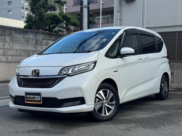 フリードハイブリッド ハイブリッド・Gホンダセンシング ワンオーナー Gathers純正ナビ フルセグTV バックカメラ シートヒーター リアソナー 禁煙 純正ドライブレコーダー  オートLEDヘッドライト 両側電動スライドドア 記録簿4枚 ETC(2枚目)