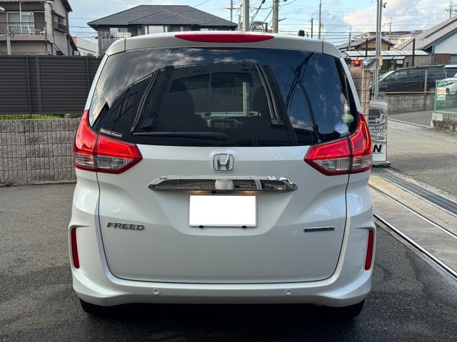 フリードハイブリッド ハイブリッド・Gホンダセンシング ワンオーナー Gathers純正ナビ フルセグTV バックカメラ シートヒーター リアソナー 禁煙 純正ドライブレコーダー  オートLEDヘッドライト 両側電動スライドドア 記録簿4枚 ETC(5枚目)
