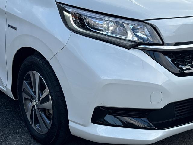 フリードハイブリッド ハイブリッド・Gホンダセンシング ワンオーナー Gathers純正ナビ フルセグTV バックカメラ シートヒーター リアソナー 禁煙 純正ドライブレコーダー  オートLEDヘッドライト 両側電動スライドドア 記録簿4枚 ETC(8枚目)