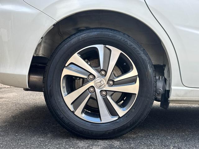 フリードハイブリッド ハイブリッド・Gホンダセンシング ワンオーナー Gathers純正ナビ フルセグTV バックカメラ シートヒーター リアソナー 禁煙 純正ドライブレコーダー  オートLEDヘッドライト 両側電動スライドドア 記録簿4枚 ETC(13枚目)