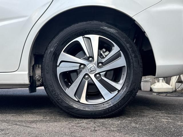 フリードハイブリッド ハイブリッド・Gホンダセンシング ワンオーナー Gathers純正ナビ フルセグTV バックカメラ シートヒーター リアソナー 禁煙 純正ドライブレコーダー  オートLEDヘッドライト 両側電動スライドドア 記録簿4枚 ETC(14枚目)