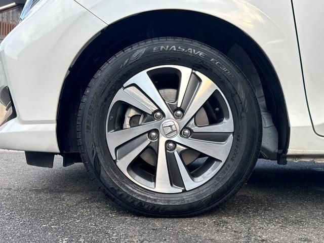 フリードハイブリッド ハイブリッド・Gホンダセンシング ワンオーナー Gathers純正ナビ フルセグTV バックカメラ シートヒーター リアソナー 禁煙 純正ドライブレコーダー  オートLEDヘッドライト 両側電動スライドドア 記録簿4枚 ETC(15枚目)